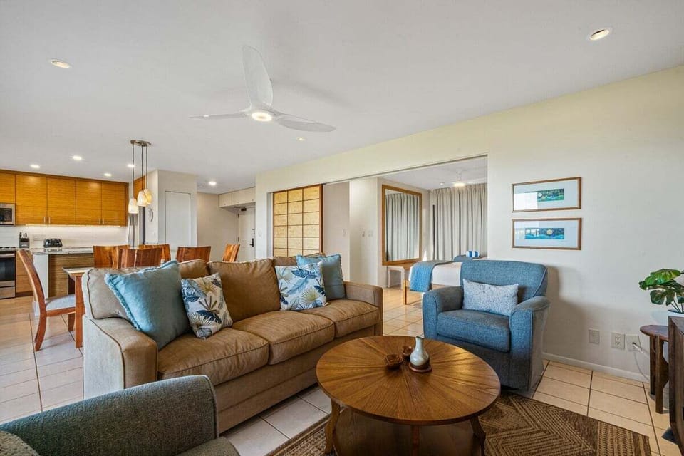 Wider frames tie the design, kitchens and dining blending into one inviting space.