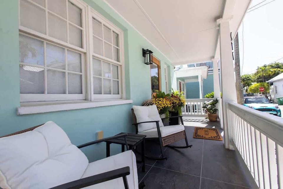 Private Front Porch with Partial Duval Street and Lighthouse Views