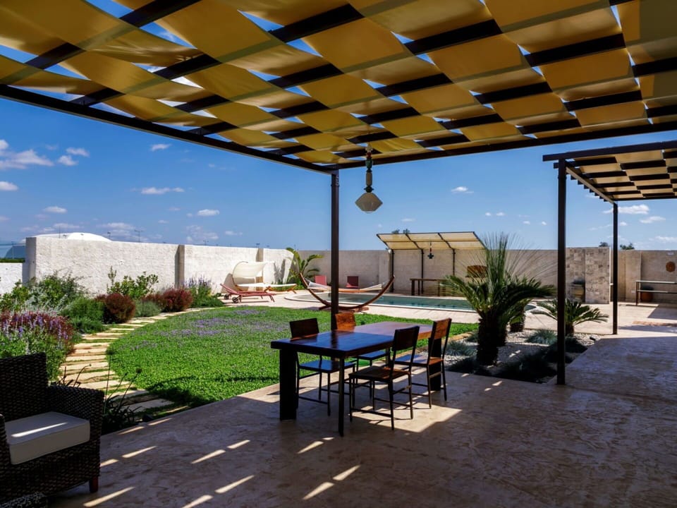 Plant, Property, Sky, Table, Shade, Building, Interior Design, Architecture, Outdoor Furniture, Outdoor Table