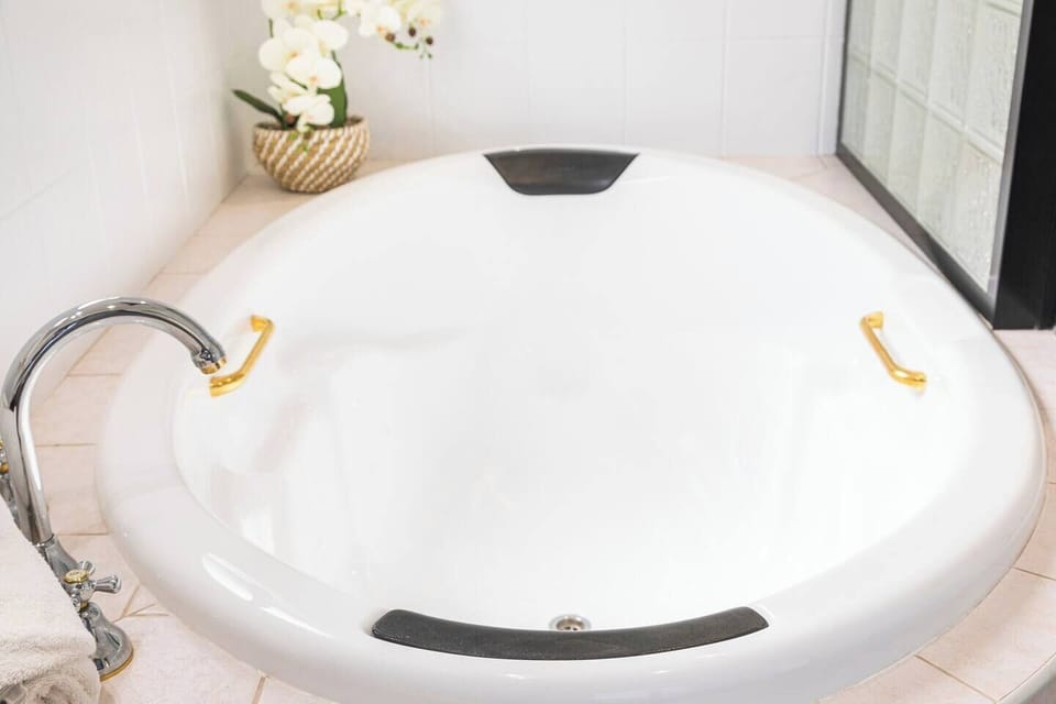 Soak it up in the ensuite bathtub