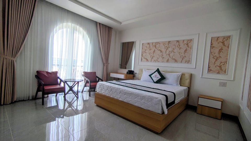Deluxe Double Room, Garden View | Desk, laptop workspace, free WiFi