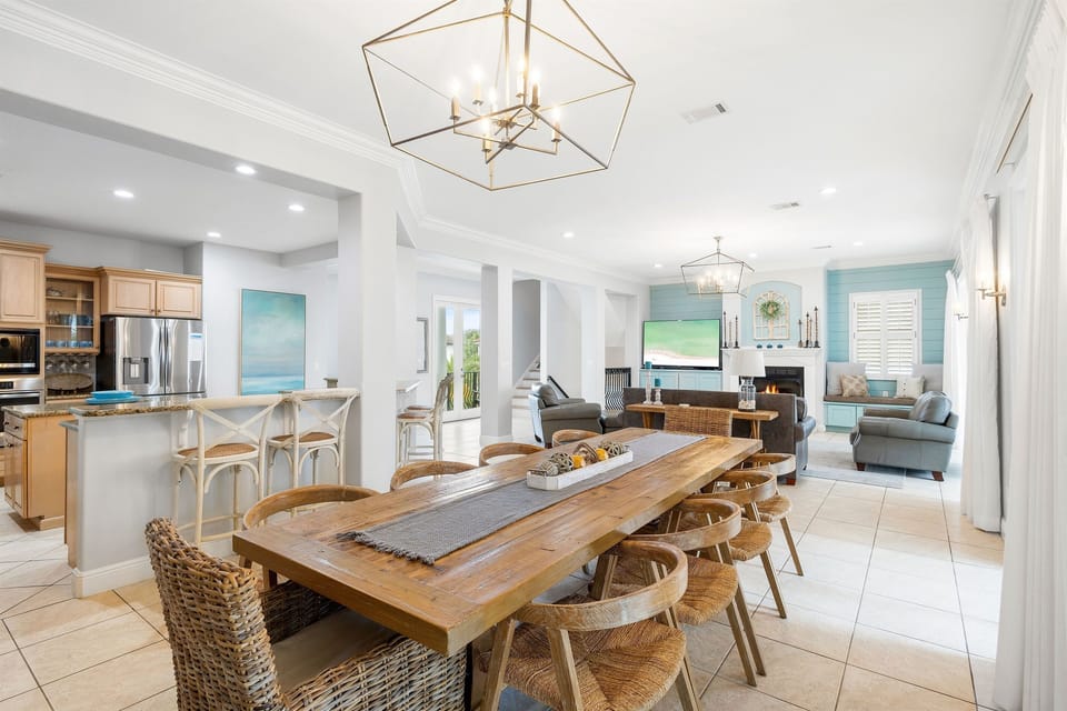 Your open-concept living space flows seamlessly from dining to kitchen to lounge, creating the perfect gathering spot for memorable meals and relaxation.