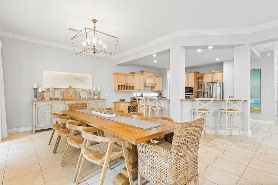 Gather around your elegant dining table where coastal charm meets modern comfort, creating the perfect space for memorable meals together.