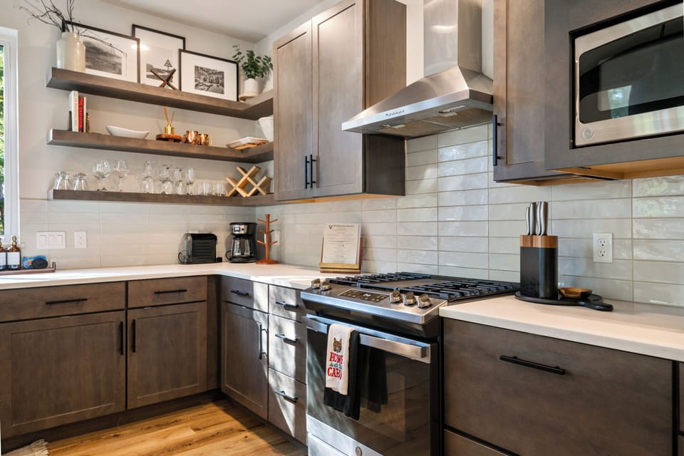 Gorgeously designed gourmet kitchen with stainless steel appliances. 