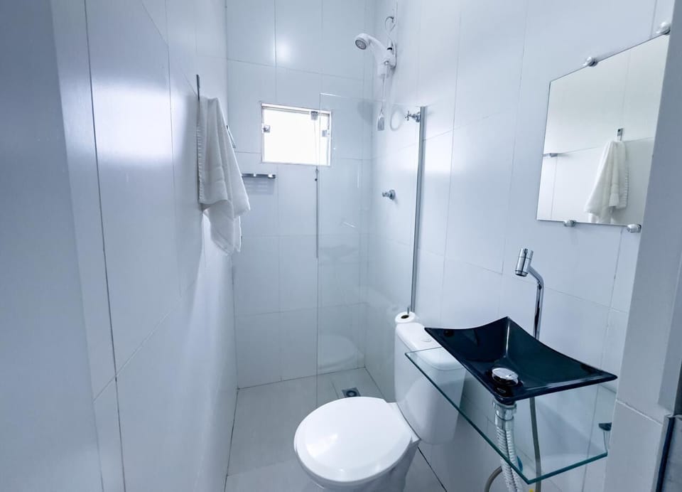 Shower, rainfall showerhead, towels, soap