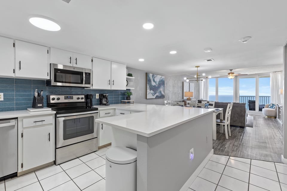 Open concept kitchen, dining, and living room