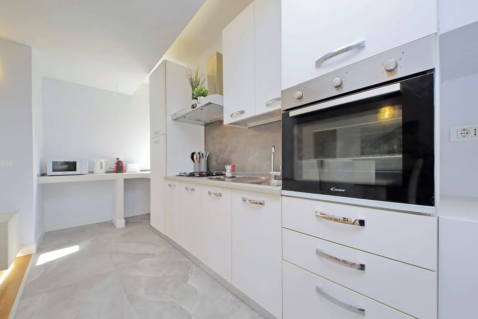 Apartment | Private kitchen | Espresso maker, electric kettle, toaster, freezer