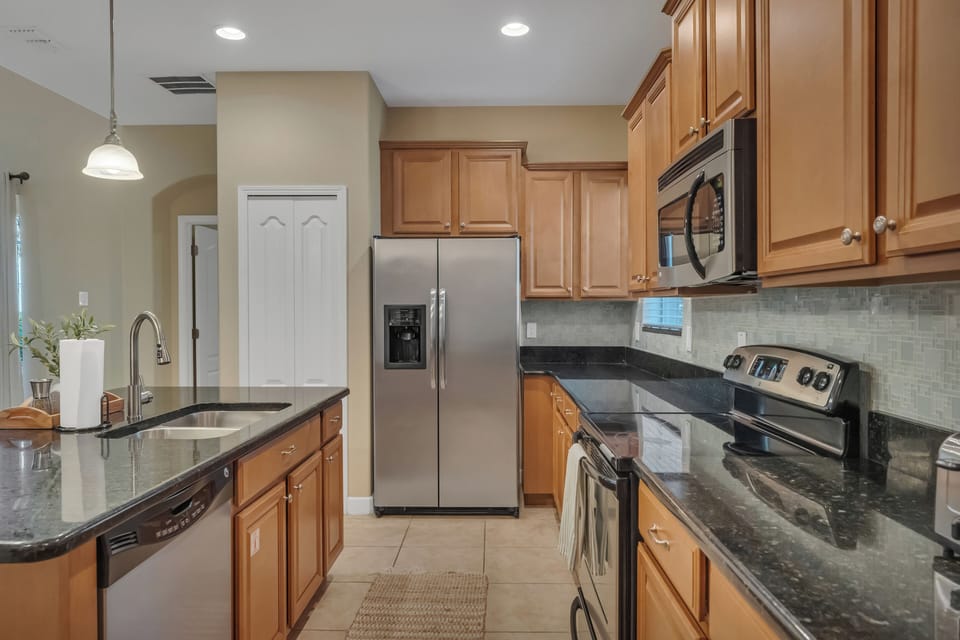 Kitchen fully equipped with modern appliances