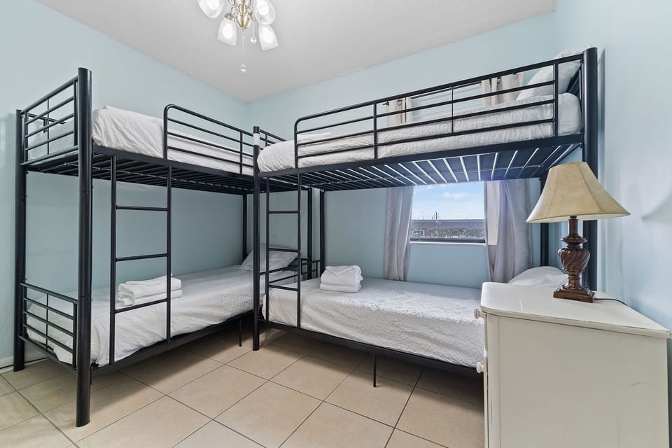 Bunk room with four twin beds.