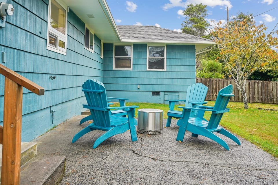 Relax in these colorful Adirondack chairs after a day of exploring downtown Seaside—just a short stroll away from shops, restaurants, and the beach