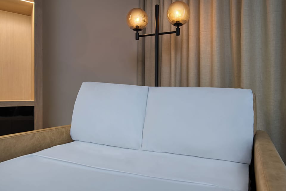 Garden Wing - 1 Bedroom Suite Access | Living area | TV