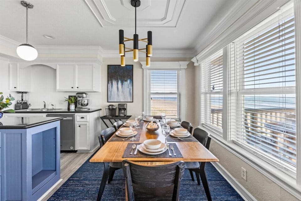 Dine in style with a view! The dining area offers comfortable seating for family meals or intimate gatherings.