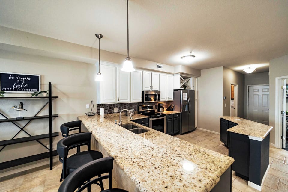 Sip morning coffee or grab a bite at the kitchen counter, with seating for 3