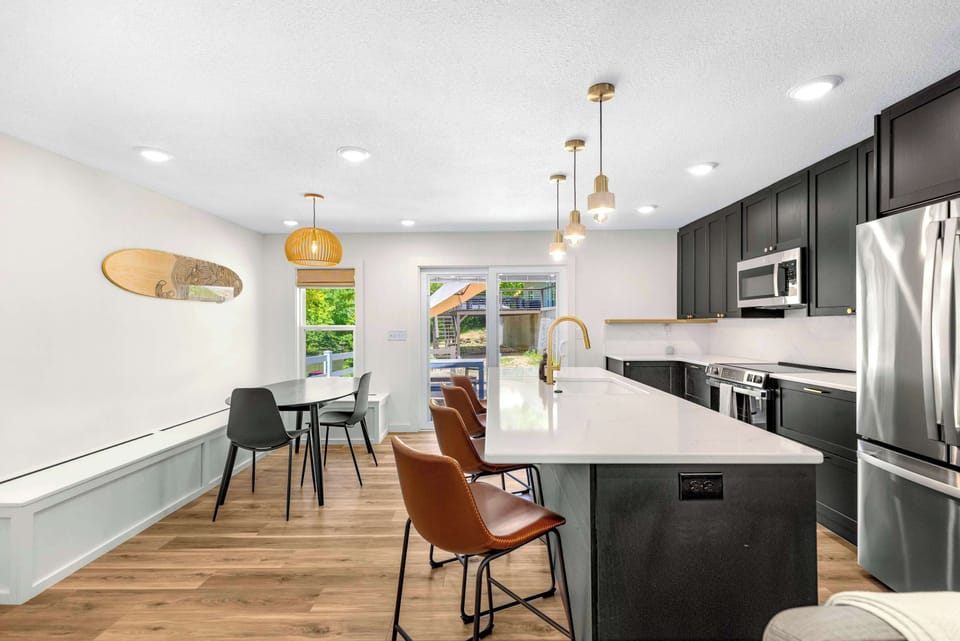 The cozy, open kitchen offers ample space & all the comforts of home