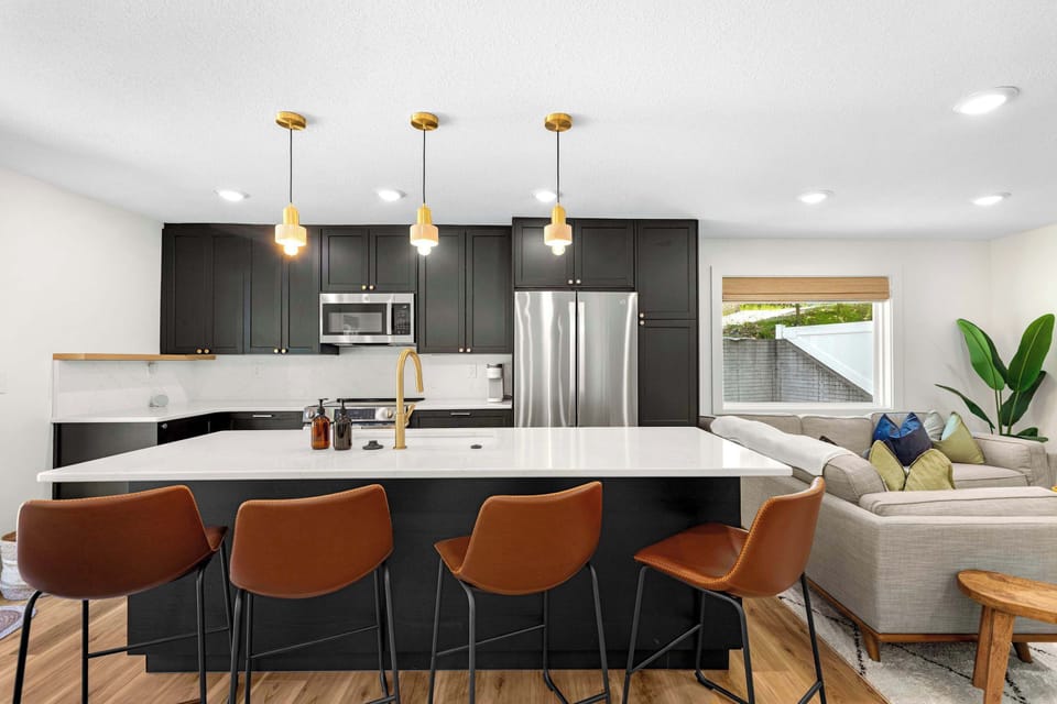 Kitchen island with seating for four—great for casual meals or keeping the cook company.