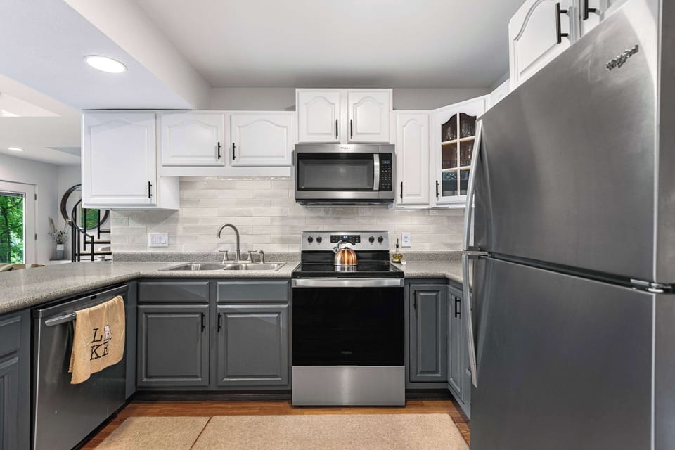 The open, airy kitchen offers ample space & all the comforts of home