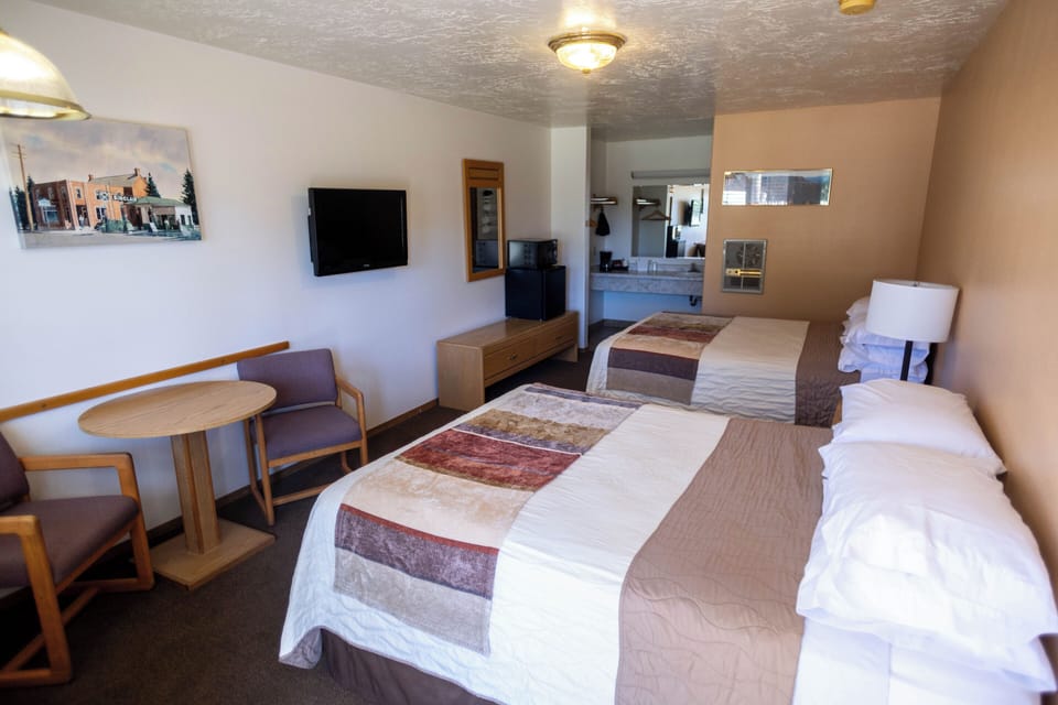 Double Room, 2 Queen Beds, Non Smoking | Laptop workspace, iron/ironing board, free WiFi, bed sheets