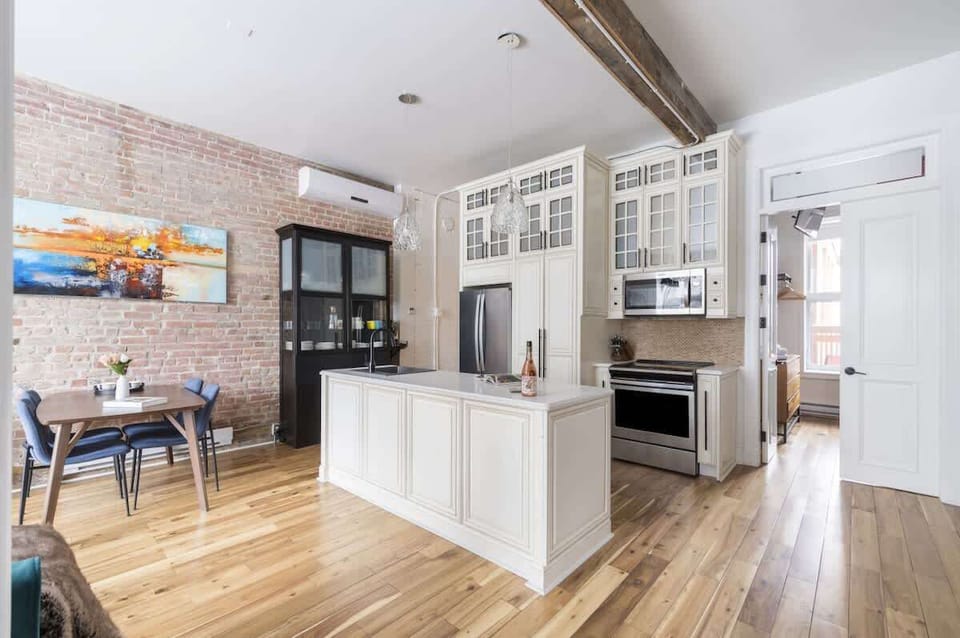 Modern kitchen countertop paired with durable vinyl flooring, combining style and practicality for everyday cooking and dining.