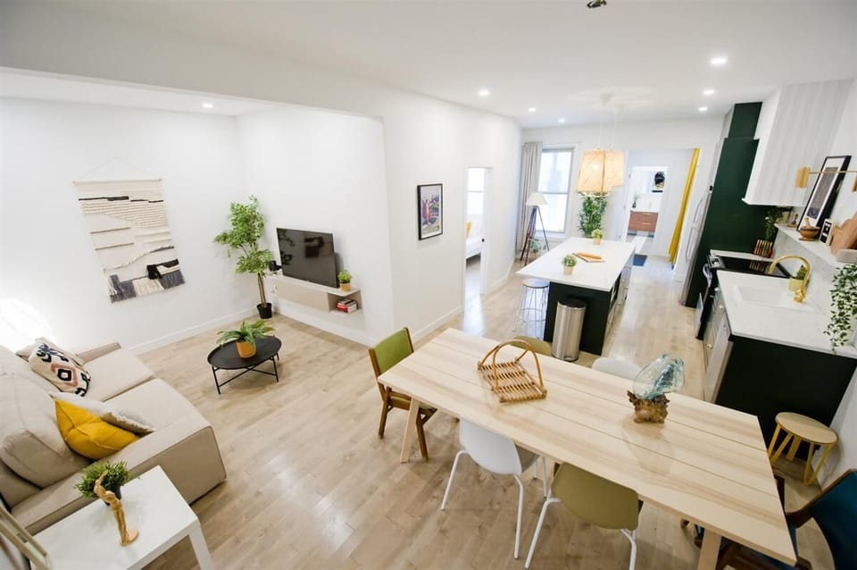 Spacious open-concept dining and living area, perfect for gathering and relaxing.