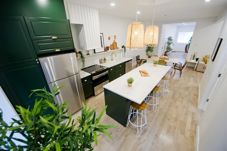 Modern designer kitchen with a large island, perfect for cooking and entertaining.