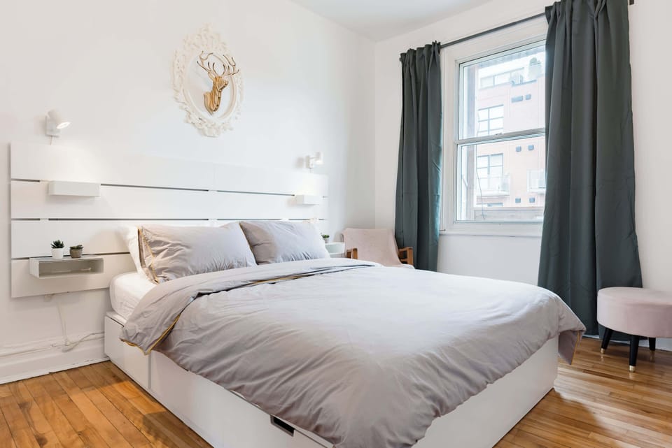 Peaceful bedroom filled with natural light, offering a calm and relaxing atmosphere.