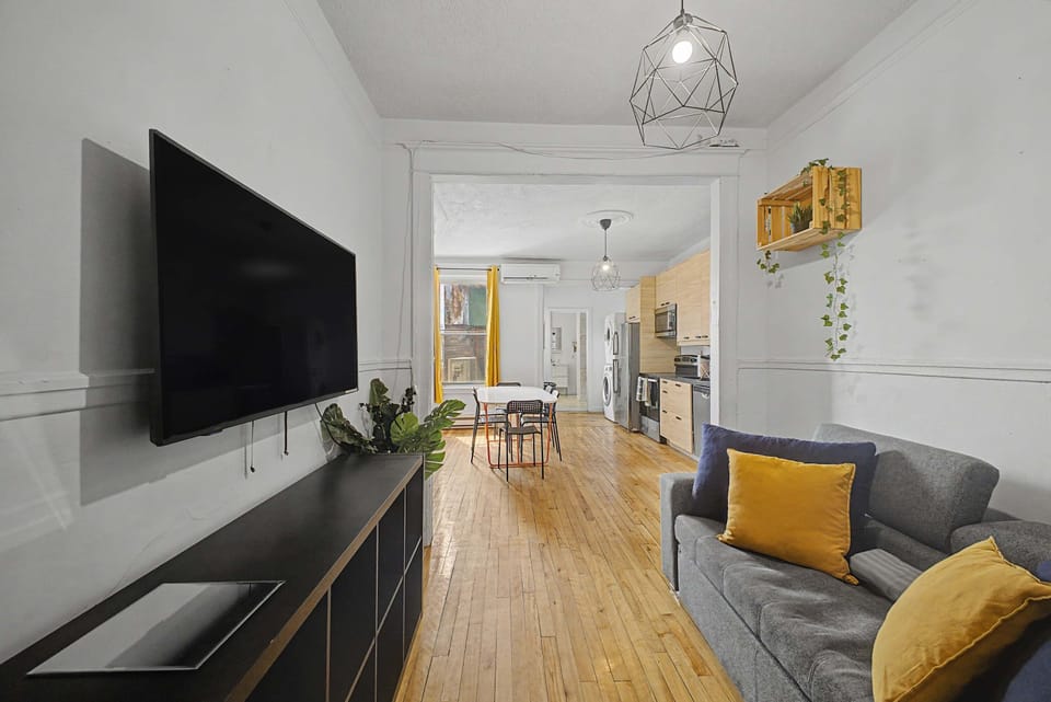 Open layout connecting between living space and dinning area, creating a bright and welcoming flow.