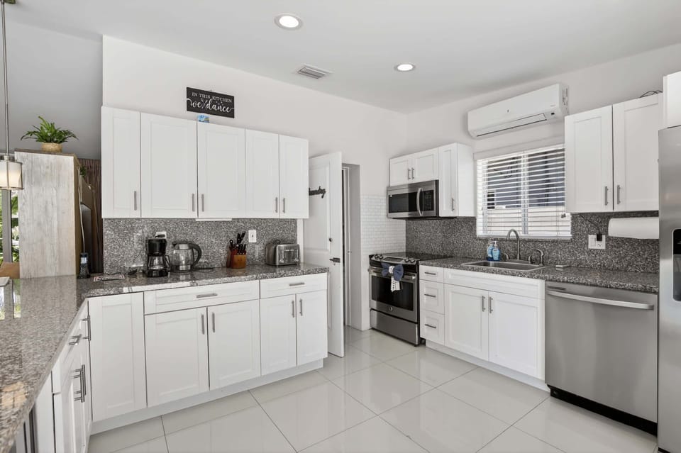 Fully Equipped Kitchen w/ patio access