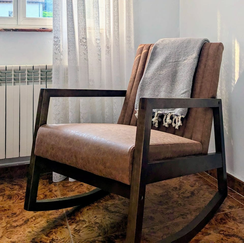 enjoy a rocking chair in the 2nd living room