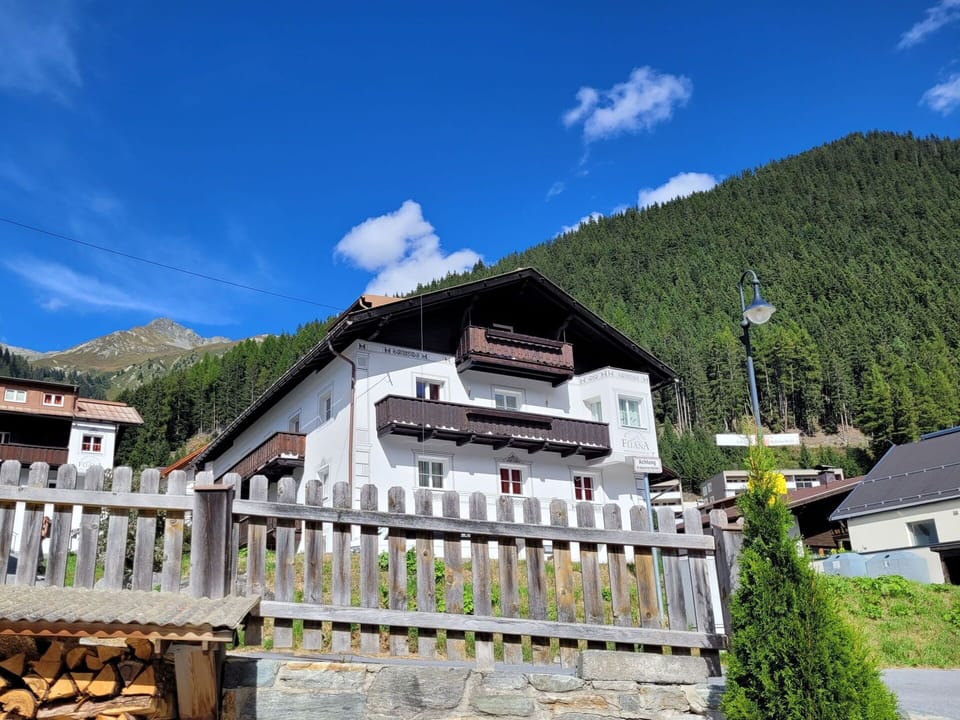 Sky, Cloud, Plant, Mountain, Building, Highland, Tree, House, Landscape, Leisure