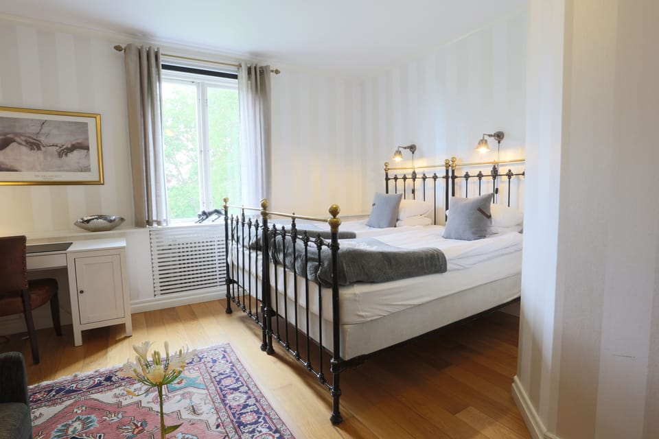 Desk, laptop workspace, free WiFi, bed sheets