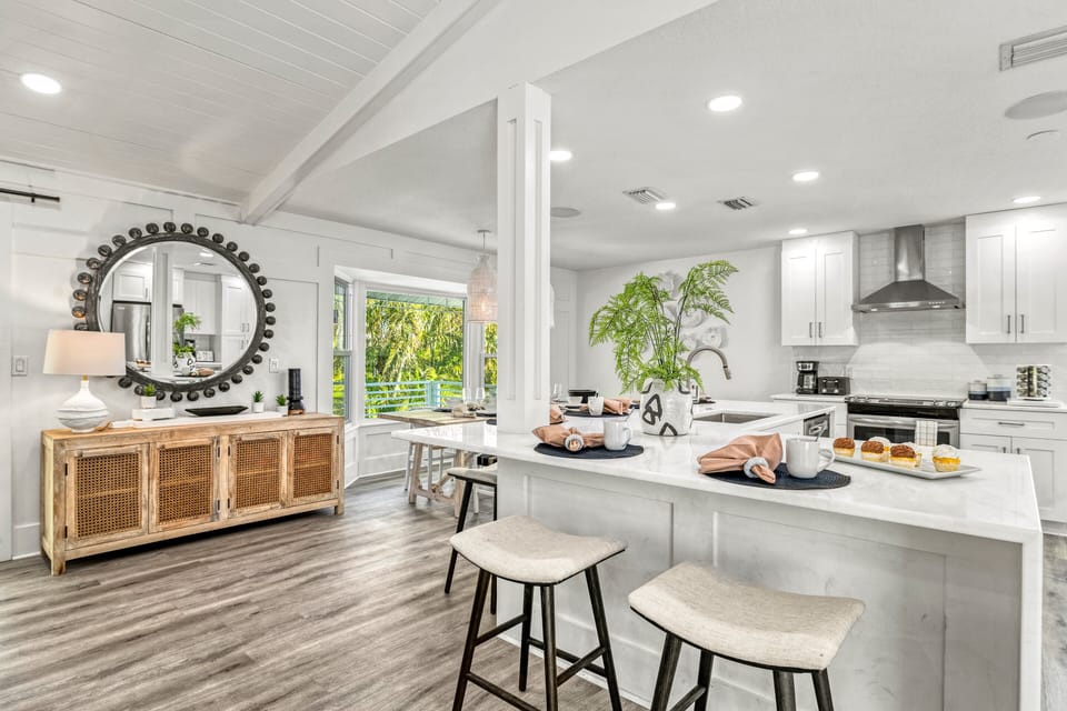 Clean lines, modern finishes, and ample prep space elevate this beach house kitchen.