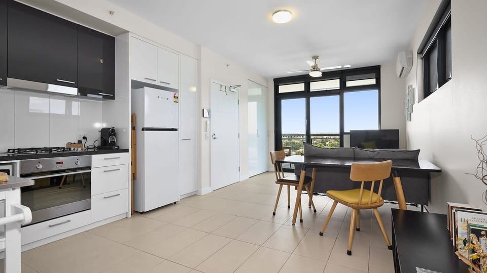 Contemporary kitchen and dining area featuring clean lines, quality appliances, and smart use of space.