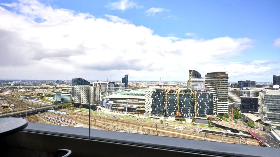 High-altitude views overlooking the city's pulse and the stadium lights