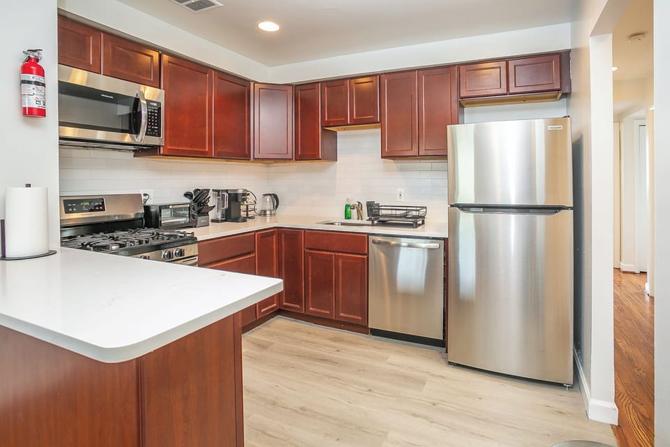 Comfort Apartment, Balcony | Private kitchen | Coffee/tea maker, electric kettle, dining tables