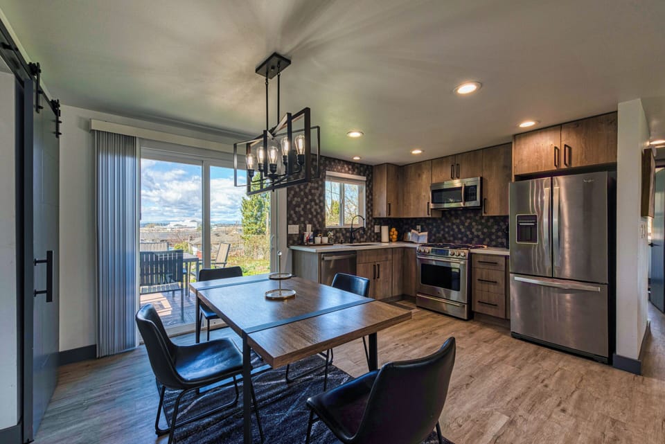 Enjoy meals in a bright, open space with contemporary decor
