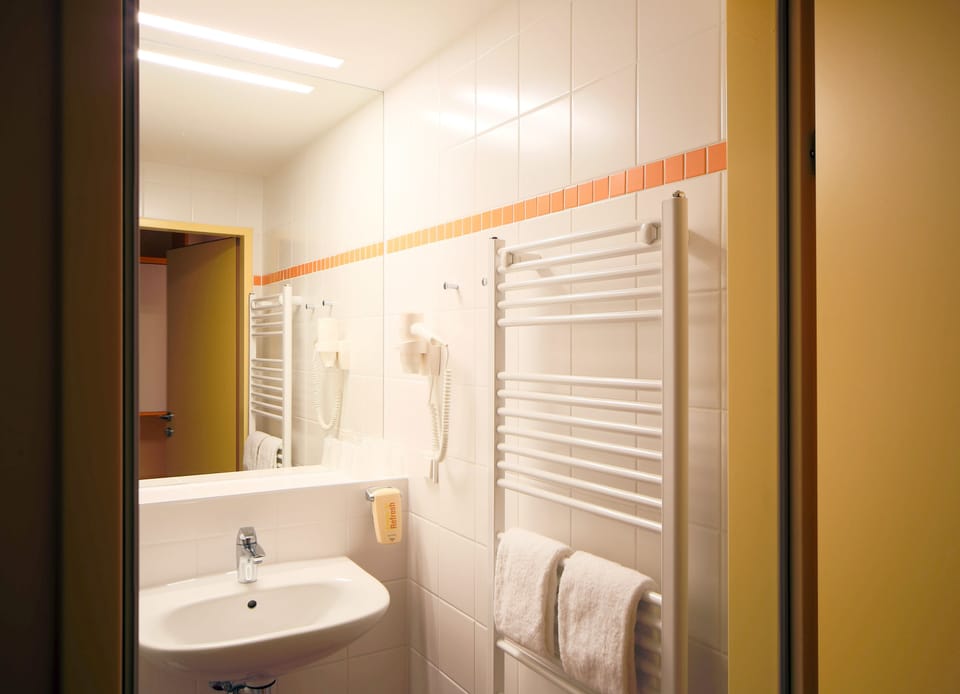 Shower, free toiletries, hair dryer, towels
