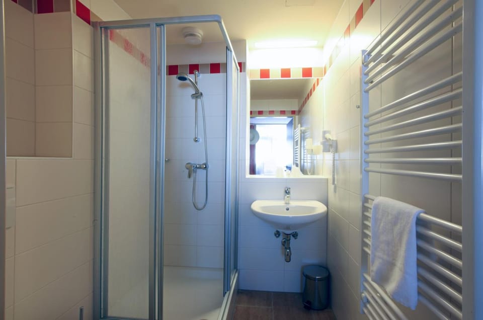 Shower, free toiletries, hair dryer, towels