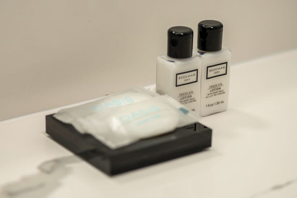 Combined shower/tub, hair dryer, towels, soap