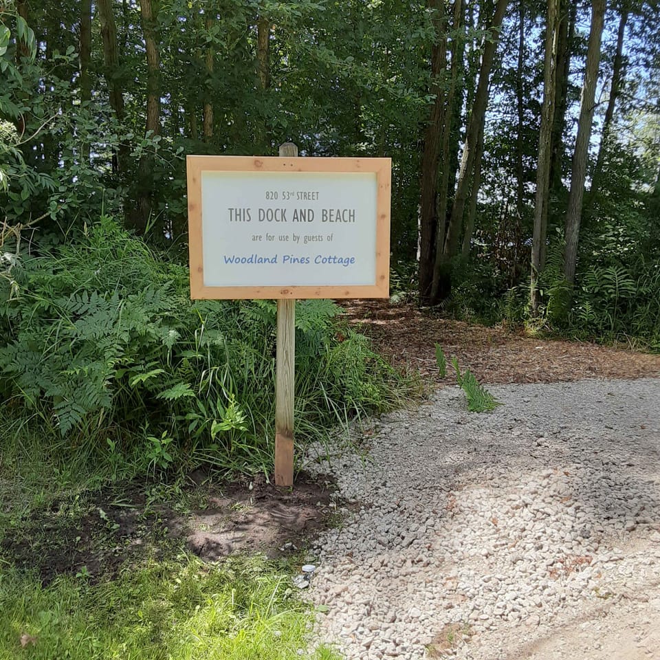 Right this way to our Woodland Pines Cottage lake access point, located just one mile away from our home! Your dogs are welcome to come along with you, but they must be leashed at all times, as required by local law.