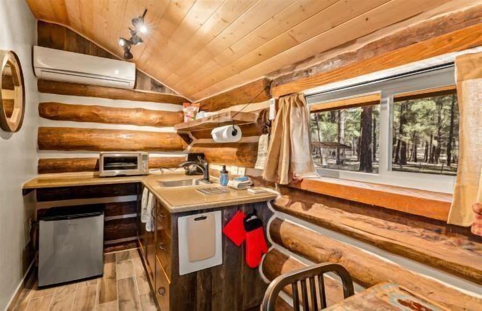 Well-Stocked Kitchenette: Mini fridge, toaster oven, and coffee maker.