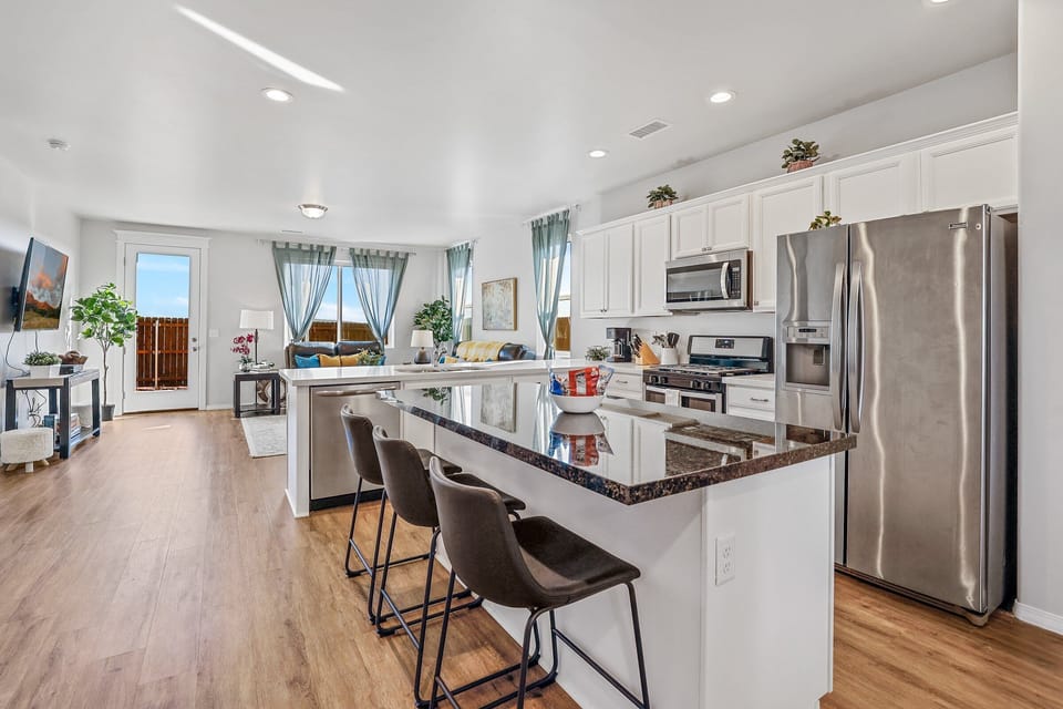 Fully Equipped Kitchen & Dining: Cook for your crowd with ease using stainless steel appliances, a slow cooker, and a stocked pantry area.