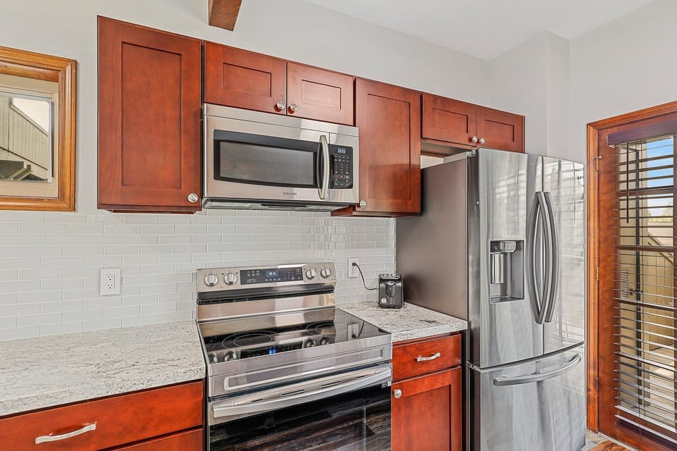 New appliances, including a coffee maker and electric kettle.