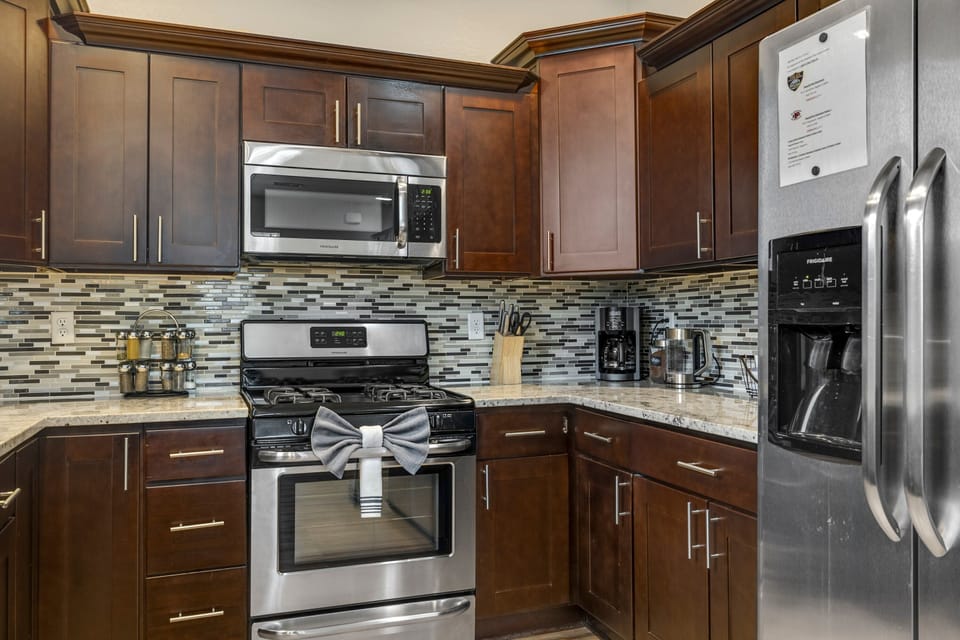 Fully Equipped Kitchen: New stainless steel appliances, granite countertops, and all the essentials.