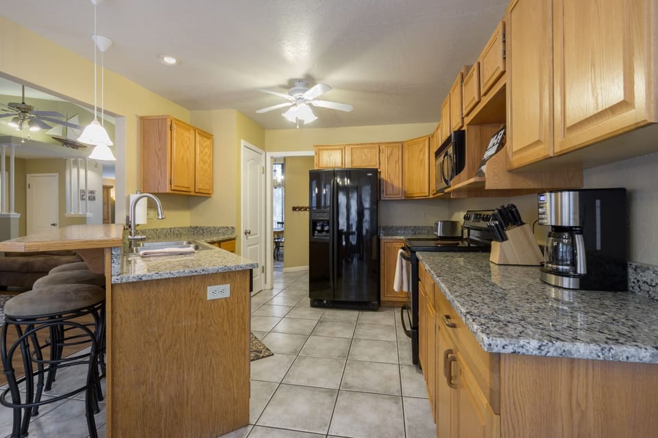 Fully equipped and functional kitchen, perfect for cooking and creating culinary delights.