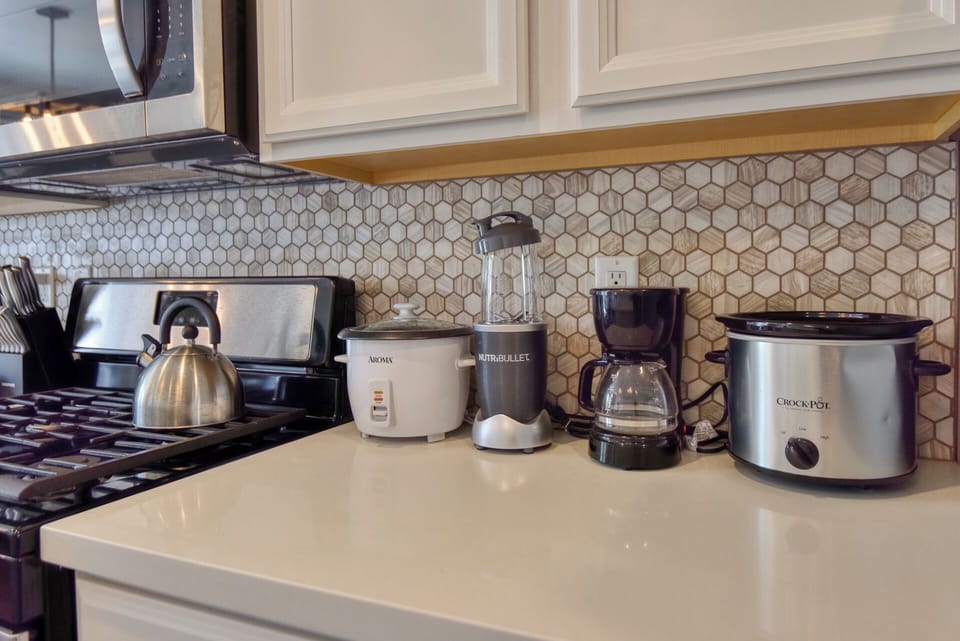 Stainless steel appliances and all the essentials make it easy to whip up delicious meals.