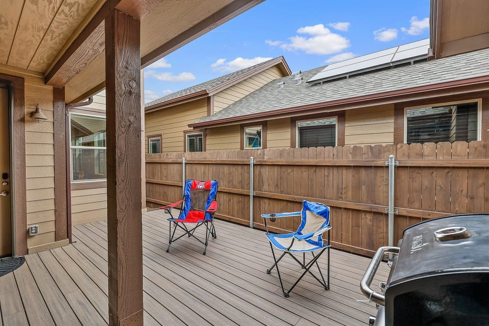 Outdoor furniture on a fenced deck