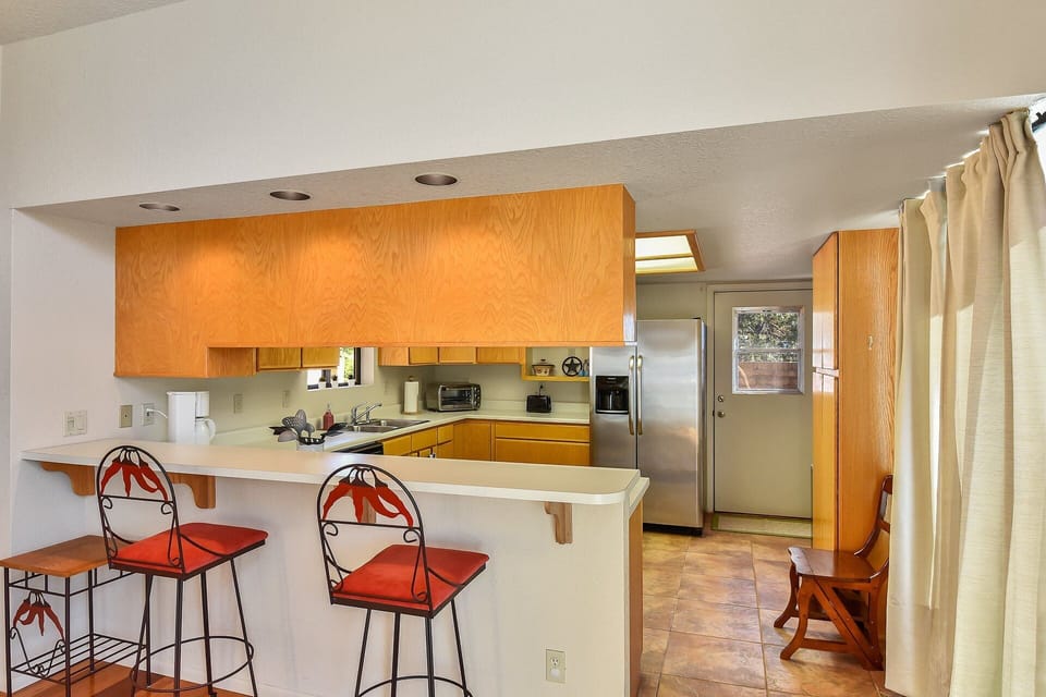 For more casual dining, there's also a kitchen counter bar that seats two.