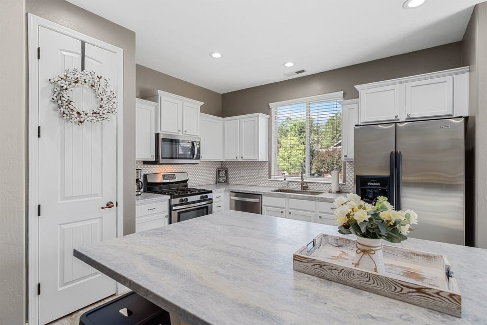 The bright and spacious kitchen is perfect for whipping up gourmet meals or quick snacks before exploring Flagstaff.
