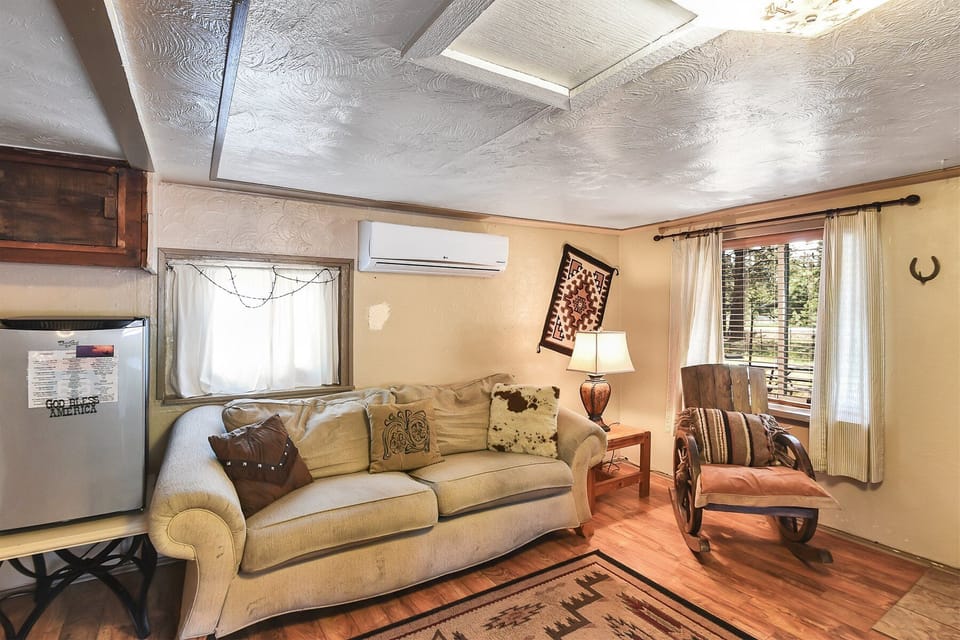 Originally built in the early 1900s using authentic railroad tiles, The Bunk House seamlessly blends rustic charm with contemporary amenities.