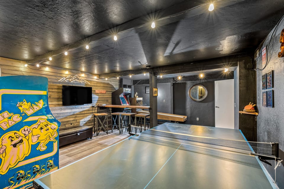 Ping Pong Table, TV, & Several Arcade Games